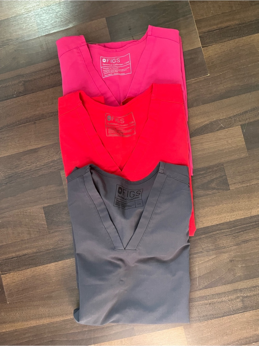 Bundle of three FIGS Women's V-Neck Scrub Top in Charcoal Gray